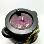 Cauldron candle with obsidian coffin